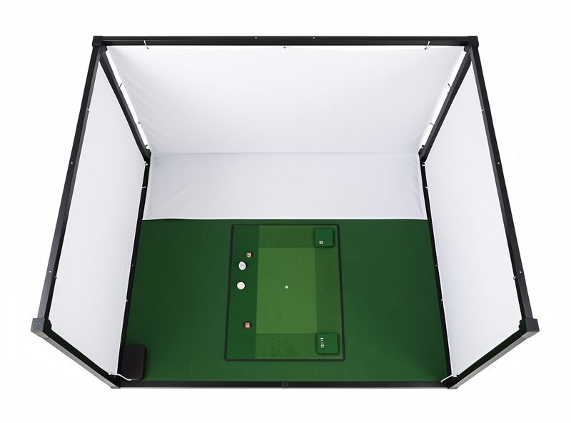 Golf simulator enclosure build seen from above showing frame, screen, and bounce-back gap