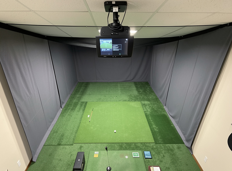 Overhead camera launch monitor mounted in a home golf simulator ceiling